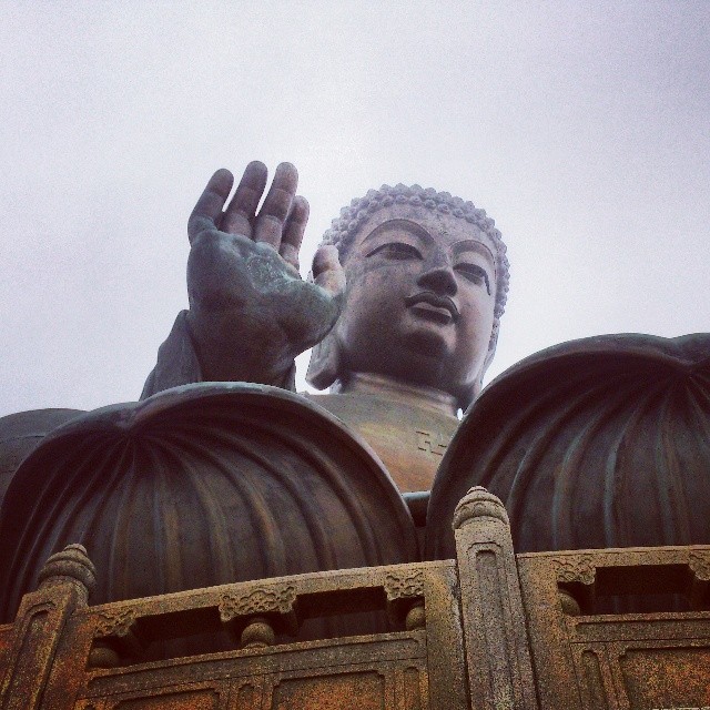 High five. Titan Tan Buddha Hong Kong.