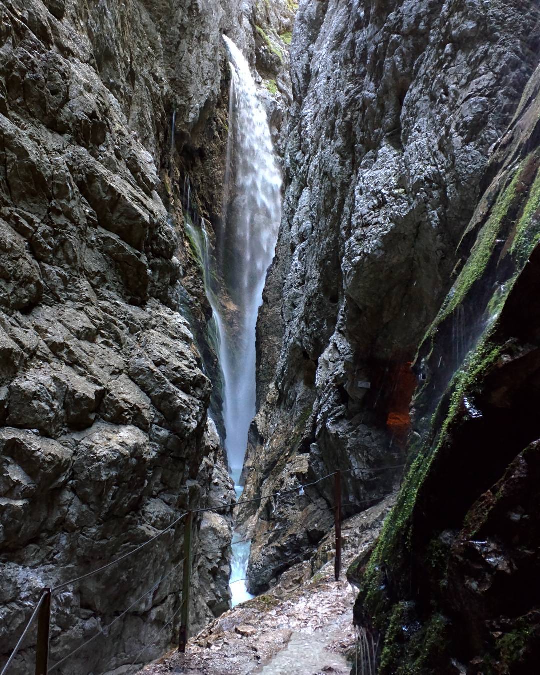 Höllentalklamm is amazing. The entrance to the gorge reminded me Norwegian fjords: granite walls hundreds meters high and lots of small waterfalls everywhere. So it's very wet there and be prepared for 600 meter ascent (half before gorge and half through it). But it definitely worth it.